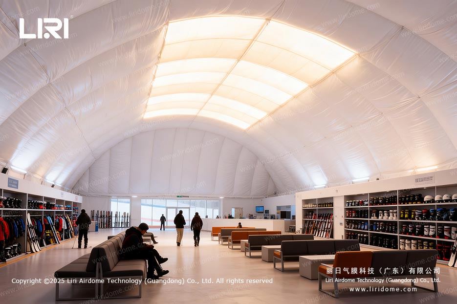 Air dome ski resort lobby with rental skis and protective equipment