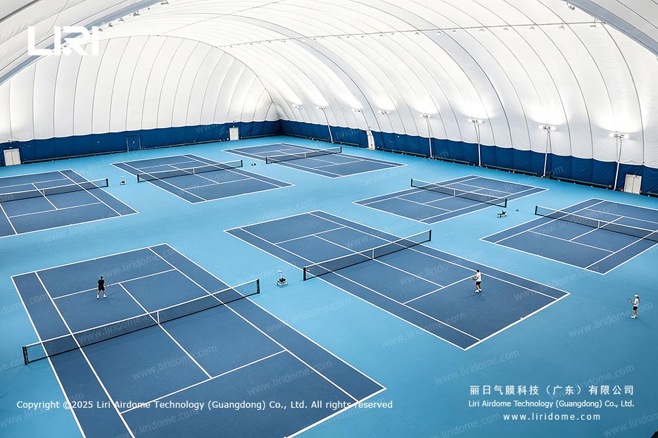 Multiple all-weather indoor tennis courts inside a column-free LIRI air dome